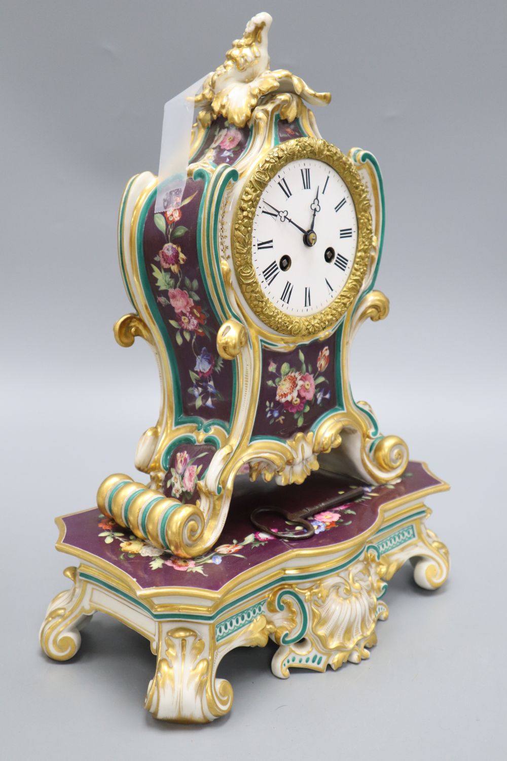 A Jacob Petit French porcelain mantel clock, height 35cm